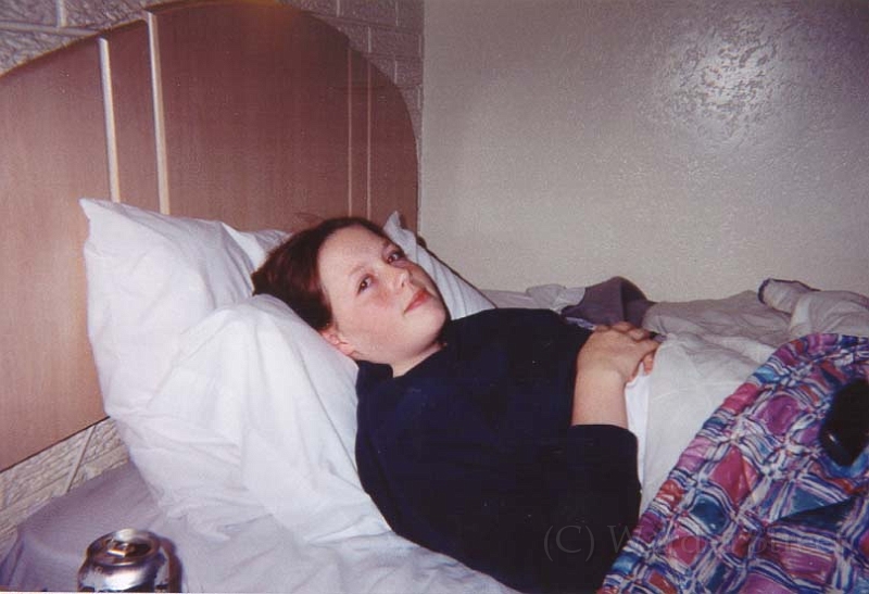 Elizabeth In Hotel Bed.jpg